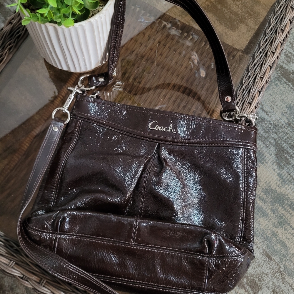 Brown patent coach crossbody